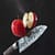 Product photography. Romi Bettison Photography. Knife slicing apple